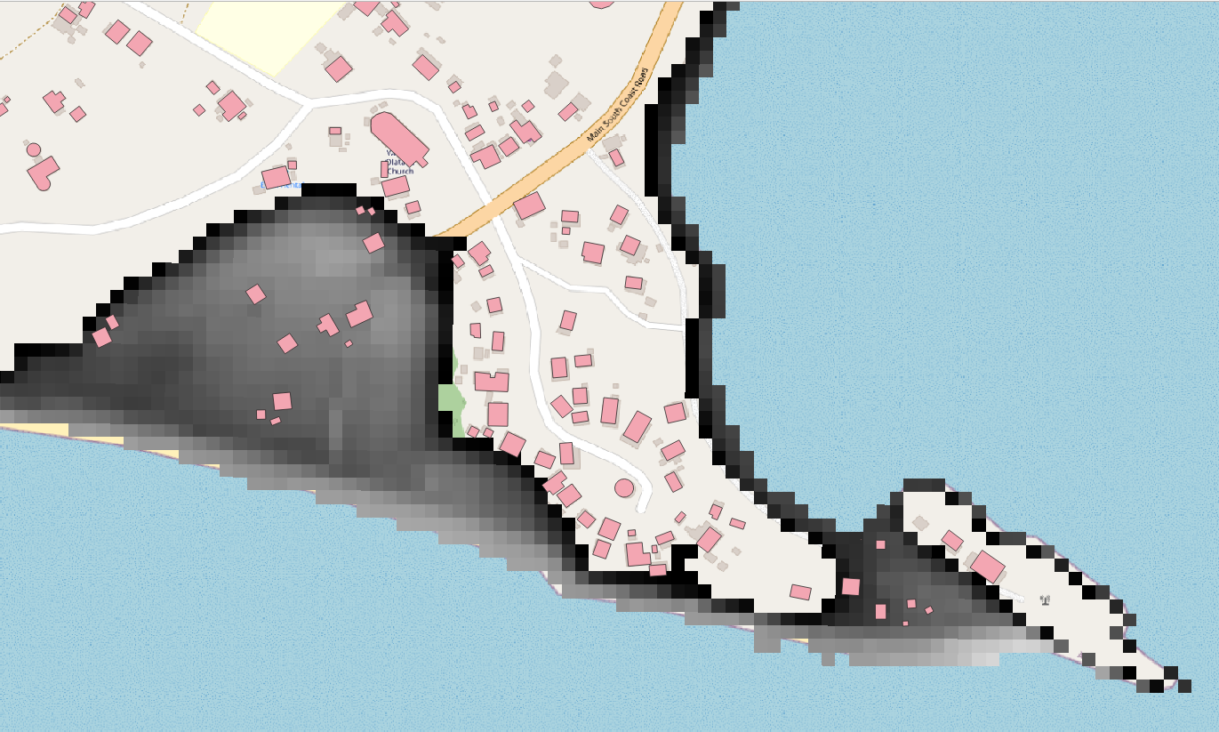 A closer-up view of building outlines in QGIS, overlaid against the tsunami inundation grid, which are greyscale squares.